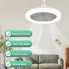 A ceiling fan with integrated light is shown in a room setting, with a sofa and plant in the foreground. Feature callouts are displayed on the left. Podgląd zdjęcia produktu