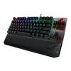 A gaming keyboard with RGB lighting and a wrist rest, shown from a diagonal angle against a white background. Produktbild-Vorschau