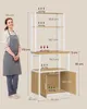 A woman stands next to a kitchen shelf unit with dimensions and weight capacity indicated by text and arrows. Náhled obrázku produktu