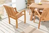 A wooden garden chair and table set on a wooden deck. Produktbild-Vorschau