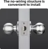 A close-up of a door lock mechanism with two doorknobs, set against a dark gray background. Text at the top highlights the product's convenient installation. Podgląd zdjęcia produktu