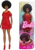 A Barbie doll in a red dress is shown next to its packaging. Podgląd zdjęcia produktu