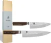 Two knives are displayed next to their packaging. Náhľad obrázku produktu
