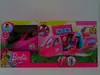 A Barbie Dream Plane toy set displayed in its retail packaging, showing the plane with dolls inside and various accessories. Produktbild-Vorschau