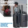 Two people hiking with walkie-talkies, with close-ups of the walkie-talkies. Produktbild-Vorschau