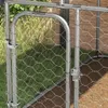 A close-up view of a gate on an outdoor dog kennel. Náhled obrázku produktu