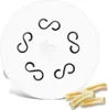 A white pasta maker disc with 'S' shaped holes and a logo in the center, with a few pieces of pasta in the foreground. Produktbild-Vorschau