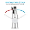 A close-up of a kitchen faucet with arrows indicating movement. Produktbild-Vorschau