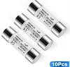 Three cylindrical fuses are arranged diagonally on a white background. Voir les images du produit
