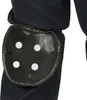 A close-up view of a black knee pad with four white circular accents, attached to dark fabric. Anteprima dell’immagine prodotto
