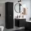 A modern black bathroom vanity and tall cabinet are shown against a white tiled wall. Náhľad obrázku produktu
