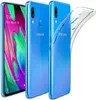 Three views of a blue Samsung Galaxy A40 smartphone with a transparent protective case. One view shows the front of the phone with the screen on, displaying the time and date. The other two views show the back of the phone, with one of them also showing th Produktbild-Vorschau