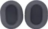 Two dark gray ear pads for headphones are shown against a white background. Podgląd zdjęcia produktu
