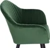 A close-up side view of a dark green velvet armchair. Produktbild-Vorschau