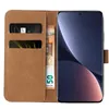 A brown flip-style phone case with slots for cards and cash, shown open with a smartphone inside. Produktbild-Vorschau