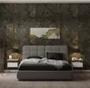 A bedroom scene featuring a bed with nightstands and a large patterned wallpaper. Produktbild-Vorschau