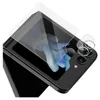 A screen protector and camera lens protectors are shown on a black smartphone. Náhled obrázku produktu