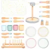 A collection of wooden toy dishes and utensils laid out on a white background. Anteprima dell’immagine prodotto