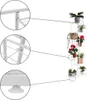 A white metal plant stand with multiple shelves, displaying various potted plants. Náhľad obrázku produktu