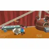 A video game scene showing a character interacting with a cow in a barn-like setting. Voir les images du produit