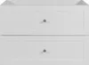 A close-up view of a white bathroom vanity with two drawers. Voir les images du produit