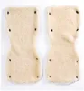 Two cream-colored, fuzzy hand warmers for a stroller, laid out flat against a white background. Náhľad obrázku produktu