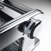 Close-up of a chrome pasta maker dial. Anteprima dell’immagine prodotto