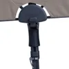 A close-up view of the adjustable mechanism and fabric of a sun umbrella. Produktbild-Vorschau