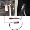 A collage showing a close-up of a grill burner and igniter assembly, and a separate image of two piezo igniter units with wires. Produktbild-Vorschau