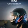 A person wearing a motorcycle helmet with a communication device attached, with sound waves emanating from it. Náhled obrázku produktu