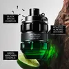 A bottle of Viktor & Rolf Spicebomb Night Vision Eau de Toilette is displayed with descriptive text overlays and accompanying natural elements. Produktbild-Vorschau