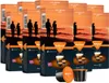Multiple boxes of Martello coffee capsules are stacked together, with a sunset beach scene on the packaging. Produktbild-Vorschau