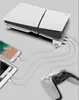 A white USB hub with multiple ports is connected to a PlayStation 5 controller and two smartphones, all charging. Produktbild-Vorschau