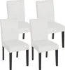 Four white dining chairs with dark legs are arranged in a studio setting against a white background.
