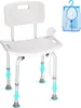 A white shower chair with adjustable legs and a blue mesh bag hanging to the side. Produktbild-Vorschau