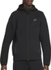 A person wearing a black Nike hoodie. Náhled obrázku produktu