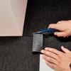 Zuschneiden einer Teppichfliese in Anthrazit Produktbild-Vorschau