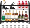 A black metal wine rack with two shelves, holding various bottles of wine and liquor, and wine glasses hanging from the bottom shelf. Podgląd zdjęcia produktu