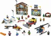 A collection of LEGO City ski resort-themed building sets, including buildings, vehicles, and minifigures, arranged on a white background. Anteprima dell’immagine prodotto