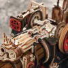 A close-up view of a detailed wooden model of a steam engine. Produktbild-Vorschau