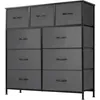 A gray fabric dresser with nine drawers and a black metal frame, shown against a light gray background. Voir les images du produit