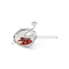 A stainless steel food mill filled with berries on a white background. Produktbild-Vorschau