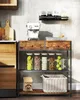 A kitchen counter with various kitchen items including an espresso machine, jars of food, a basket, and a wooden cabinet. Náhled obrázku produktu