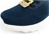 A close-up view of the toe area of a blue Skechers Slip-Ins shoe. Voir les images du produit