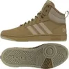 A pair of beige Adidas Hoops Mid sneakers, shown from the side and the sole. Anteprima dell’immagine prodotto