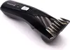 A black Remington hair clipper is shown against a white background. Anteprima dell’immagine prodotto