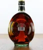 A bottle of Vecchia Romagna brandy on a wooden surface. Anteprima dell’immagine prodotto