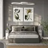 A bedroom scene with a bed, nightstands, and artwork. Anteprima dell’immagine prodotto