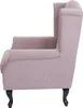 A side view of a pink armchair. Voir les images du produit