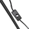 A close-up shot of a black power cord with an inline switch attached to a black pole, likely part of a lamp. Produktbild-Vorschau